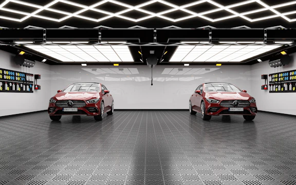 A spacious modern garage featuring a reflective metallic epoxy floor with swirling silver and blue tones.