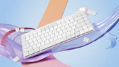 Colorful usernames floating above a keyboard in a creative workspace.