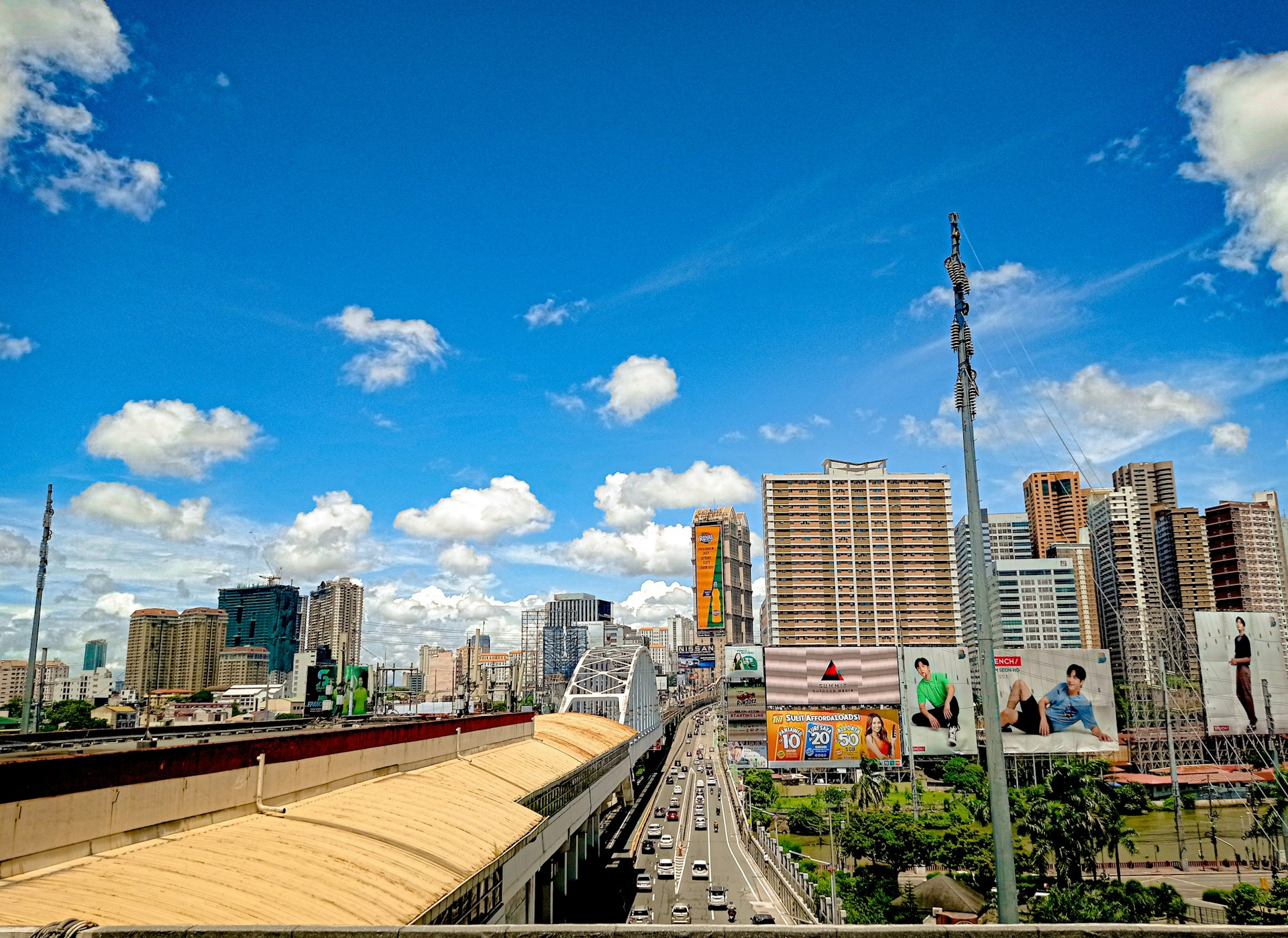 woman wearing yellow long-sleeved dress under white clouds and blue sky during daytime