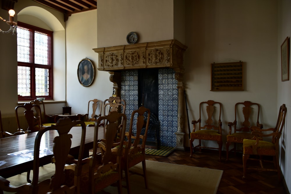 a dining room with a table and chairs