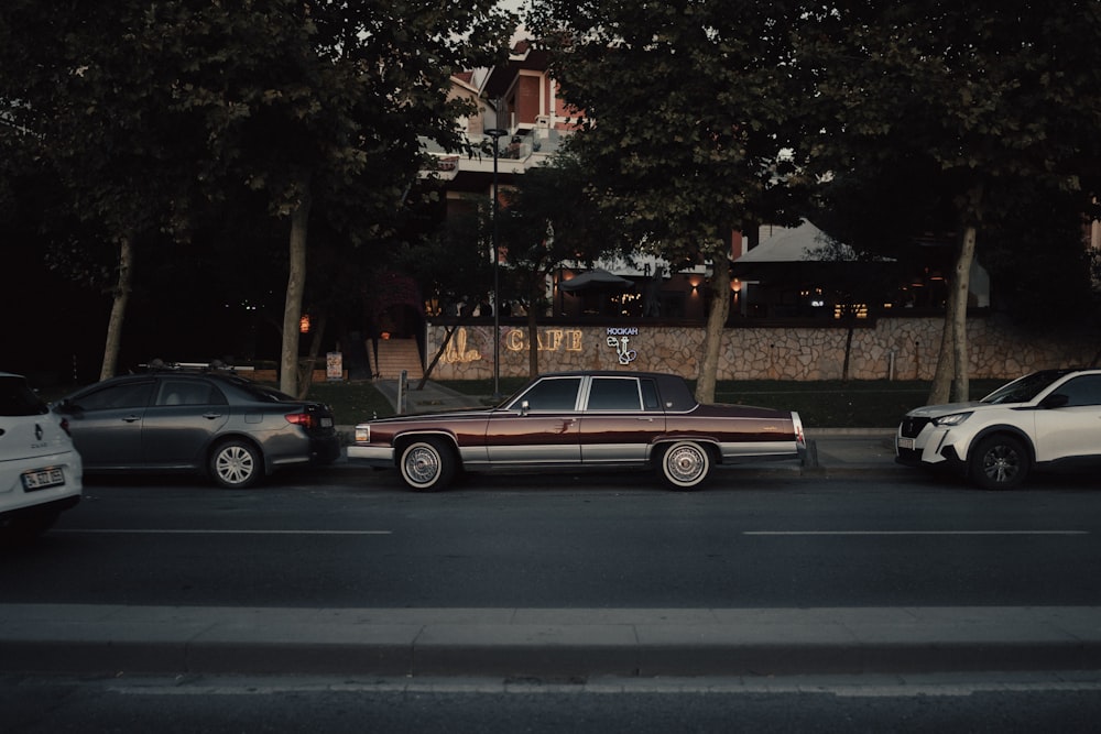 a group of cars parked on the side of a road