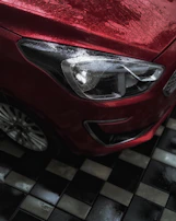 Before and after comparison images of a car’s dull paint restored to vibrant shine.