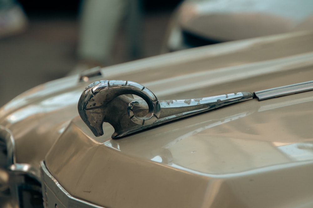 a close up of a car's hood ornament