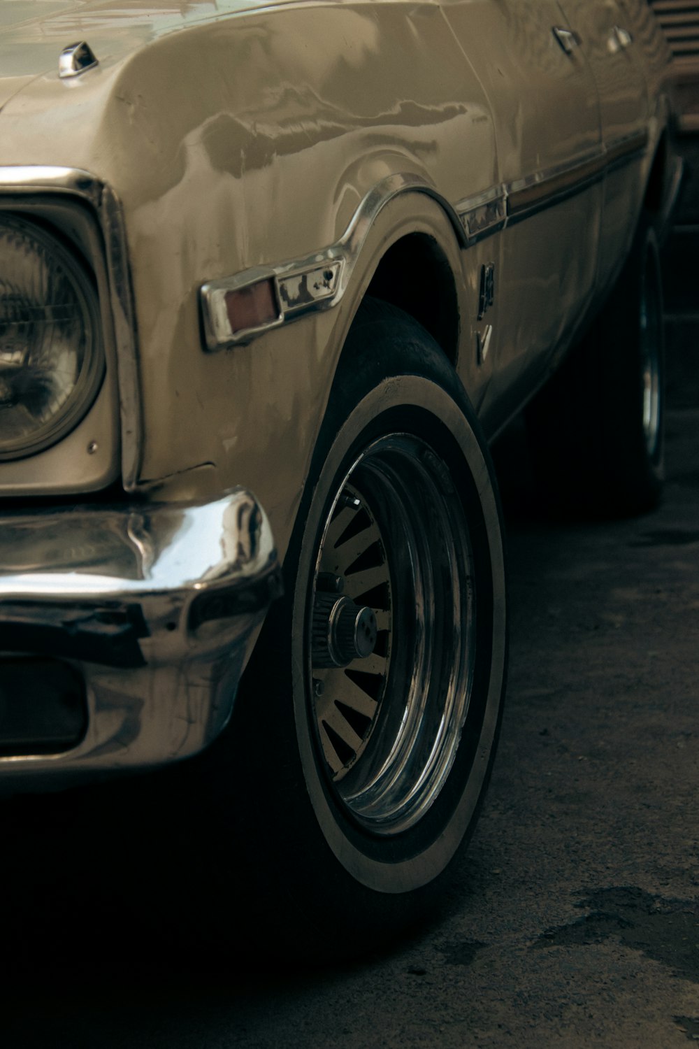 a close up of a car parked in a parking lot