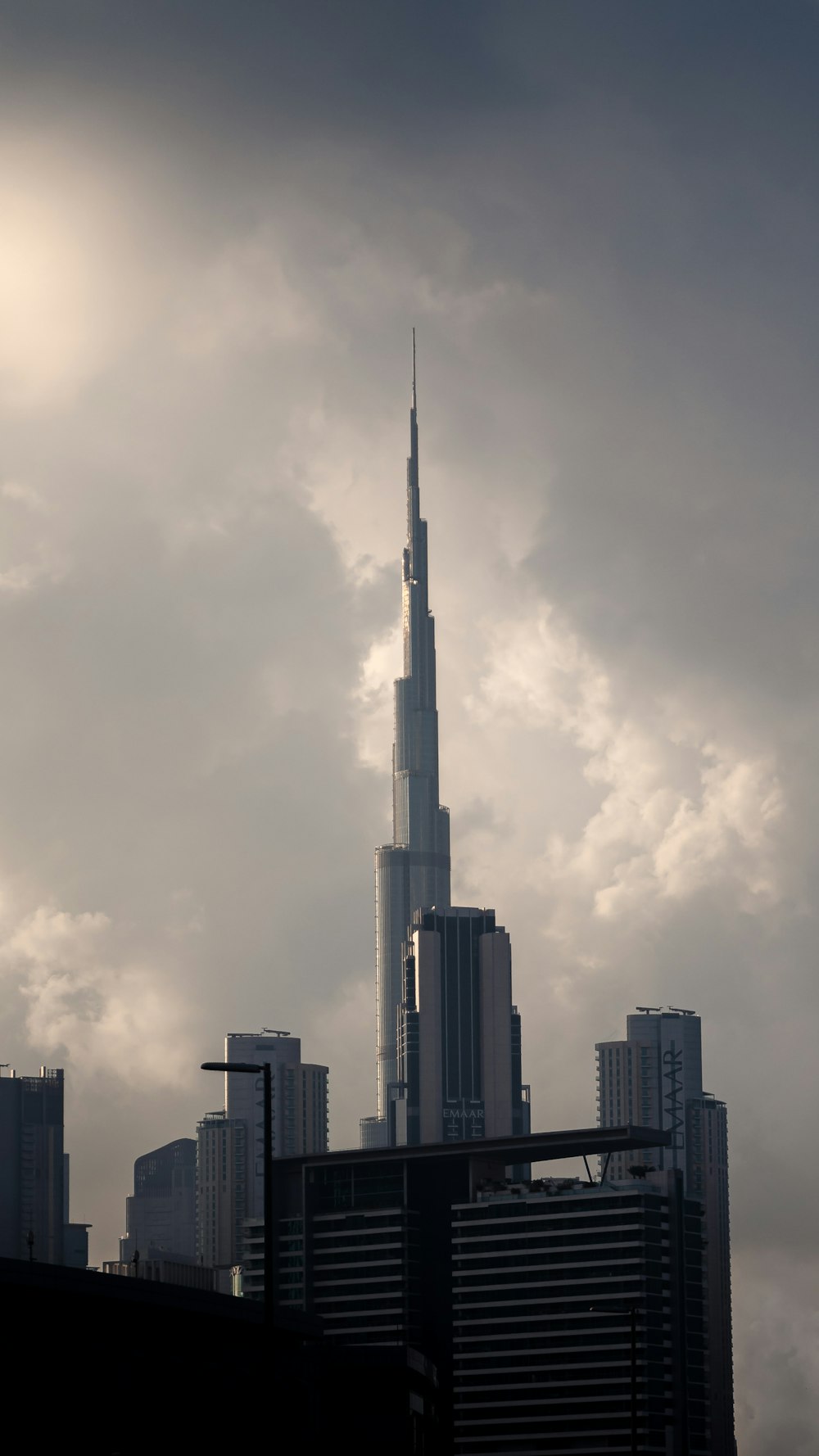 a very tall building towering over a city