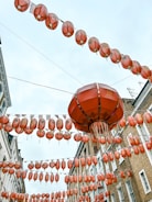Students celebrating with Chinese lanterns during a cultural festival.
