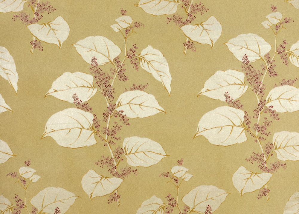 a close up of a wallpaper with leaves and flowers
