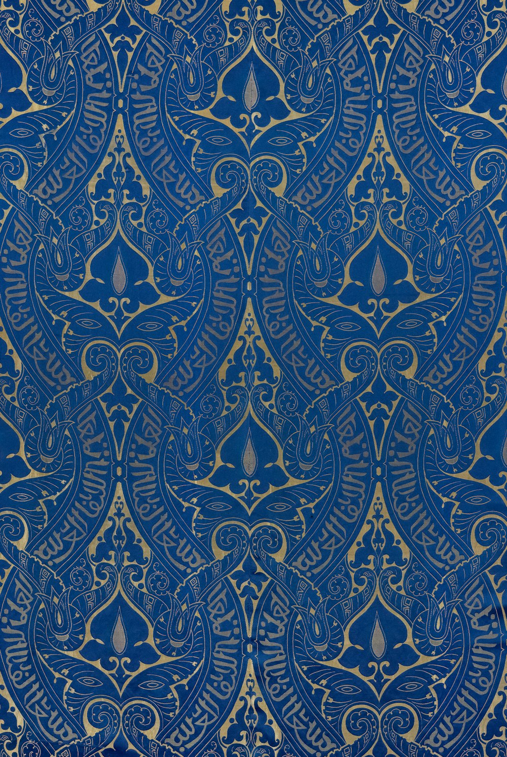 a blue and gold wallpaper with ornate designs