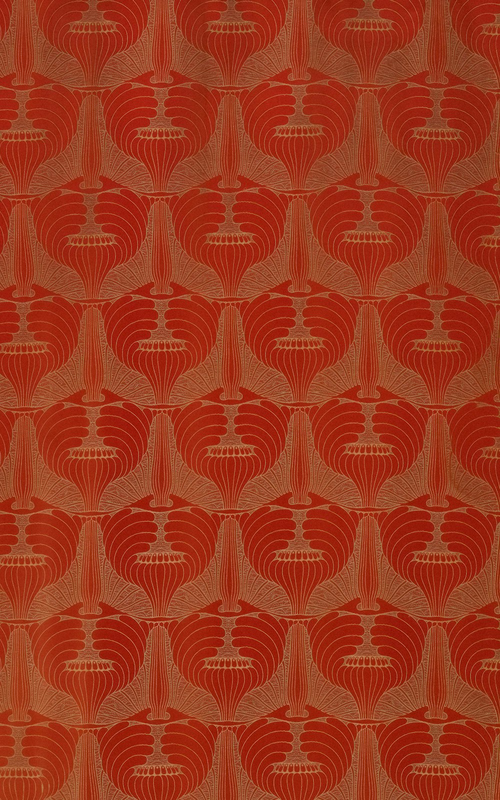 an orange and red wallpaper with a design on it