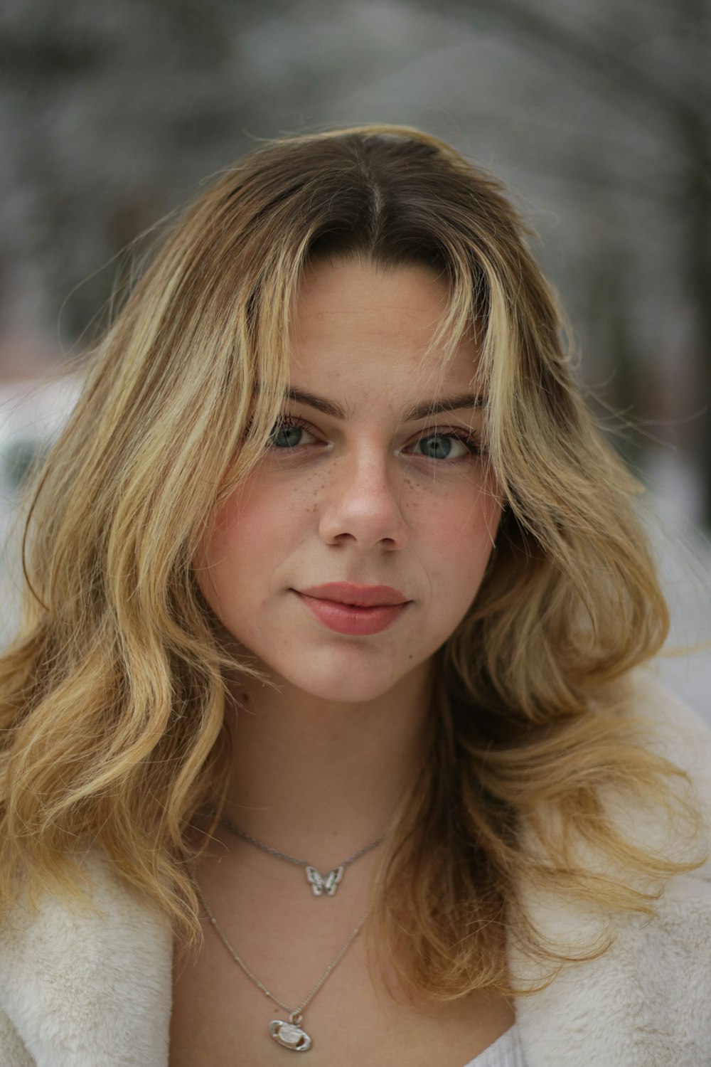 a close up of a person wearing a jacket