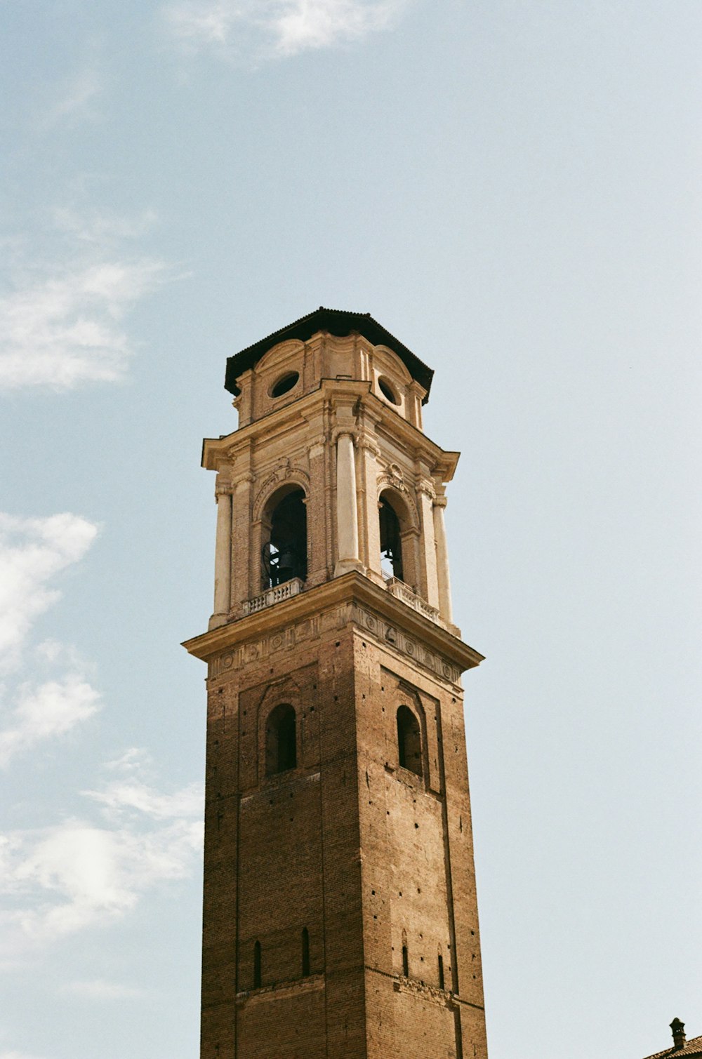 a tall clock tower with a sky background