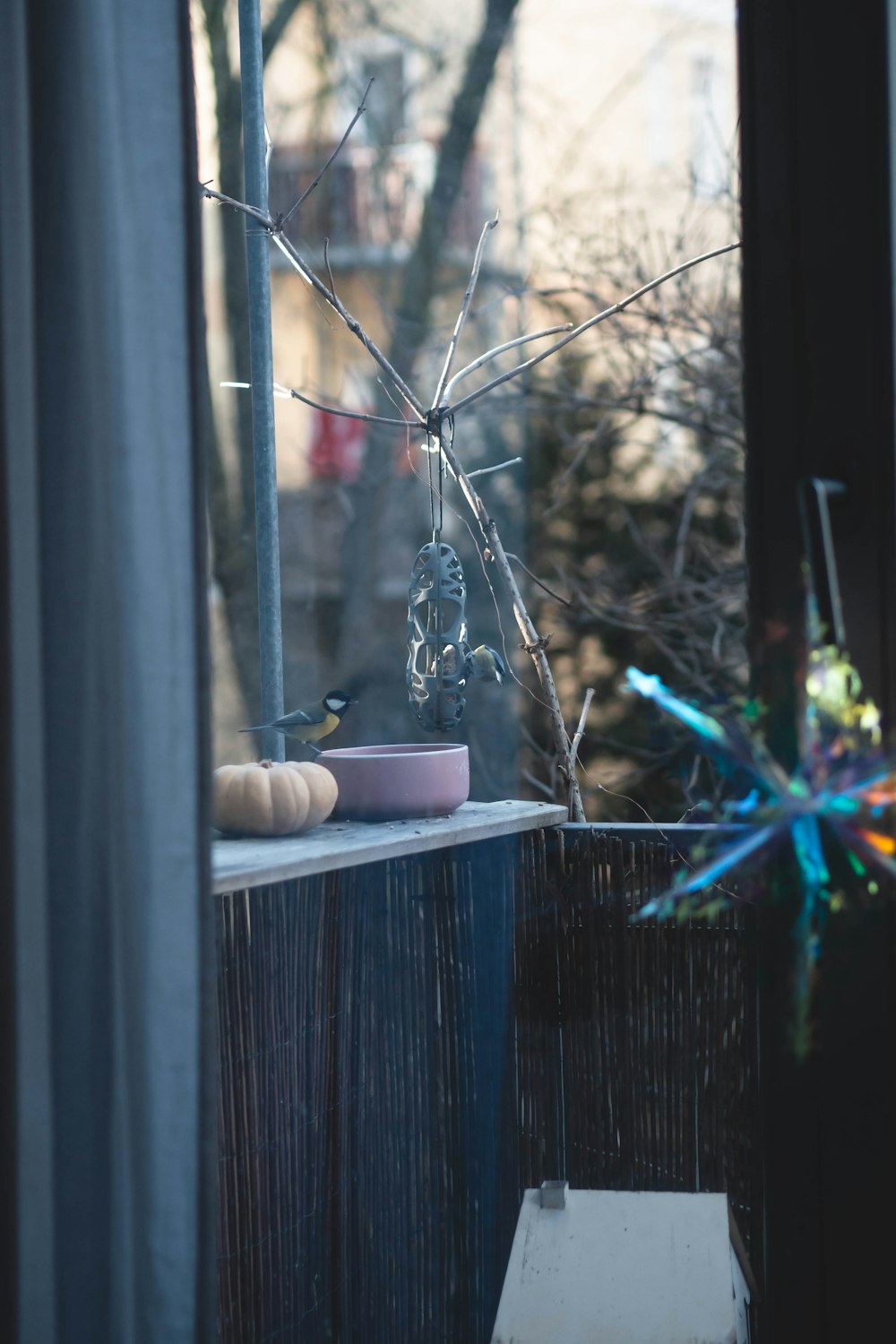 a window sill with a vase on it