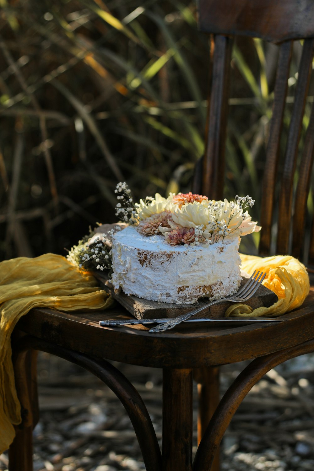 a cake sitting on top of a wooden table