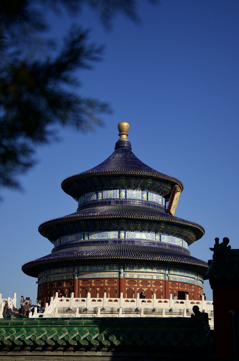 a tall building with a sky background