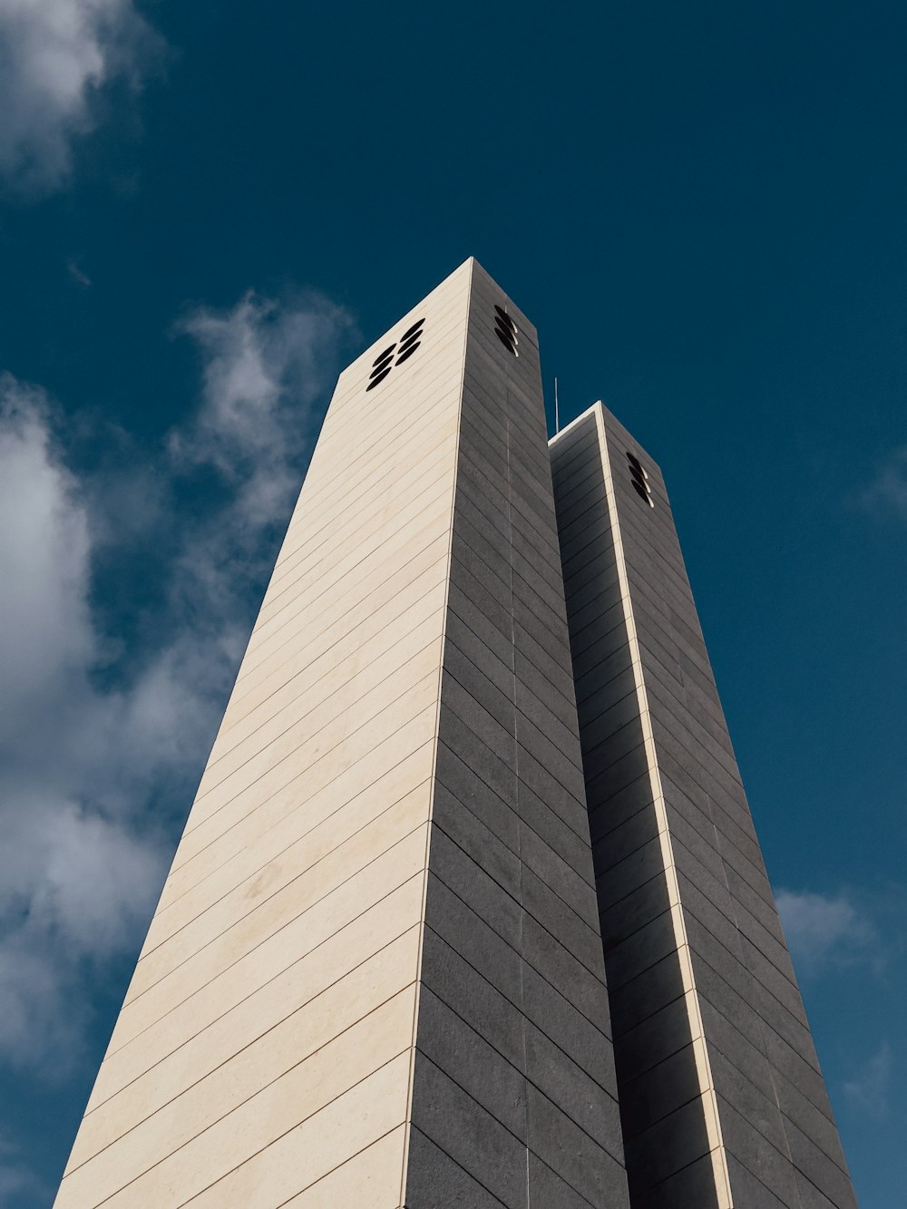 a tall building with a clock on the top of it