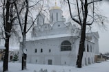 The church exterior decorated for a festive Orthodox holiday.
