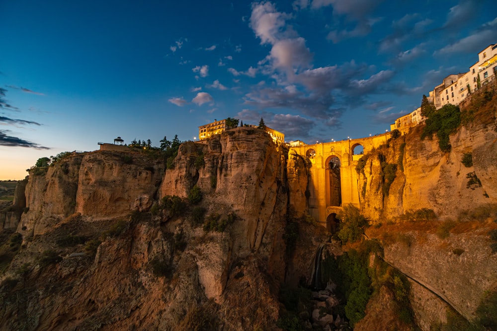 a castle perched on top of a cliff