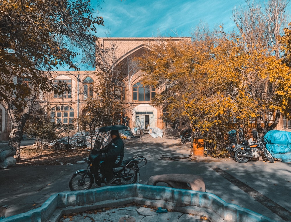 a motorcycle parked in front of a building