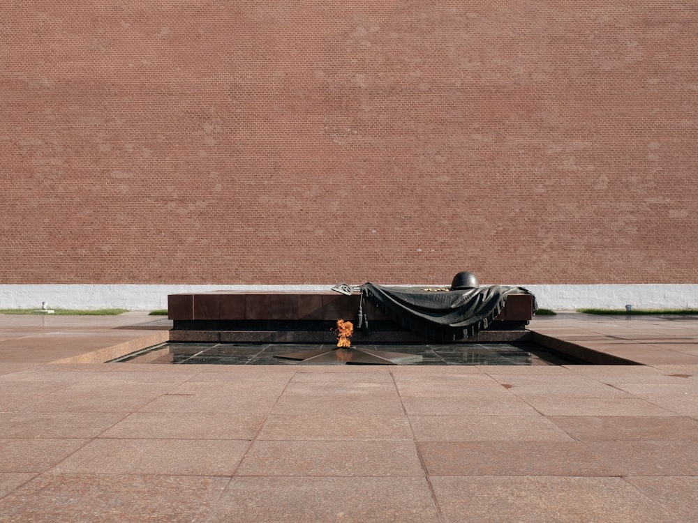 a monument with a cloth draped over it