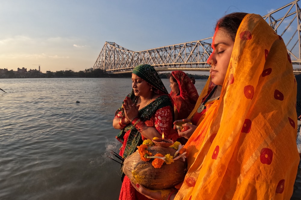 a couple of women standing next to each other