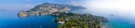 A panoramic view of the coastline from the boat.