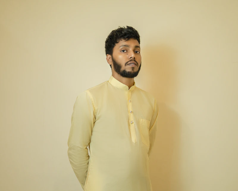 Man in a yellow traditional kurta
