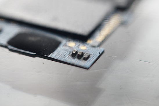 Close-up of a circuit board with highlighted components representing stages of a hardware attack chain.