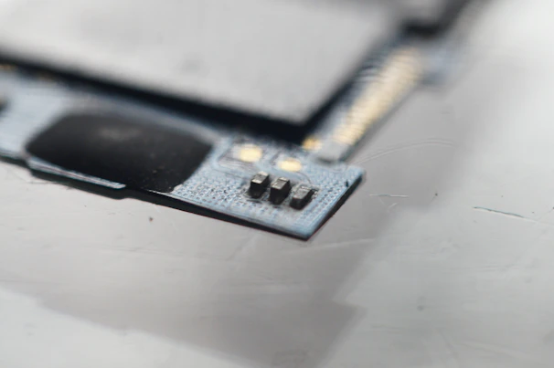 Close-up of microchips and nano digital components arranged neatly on a circuit board.