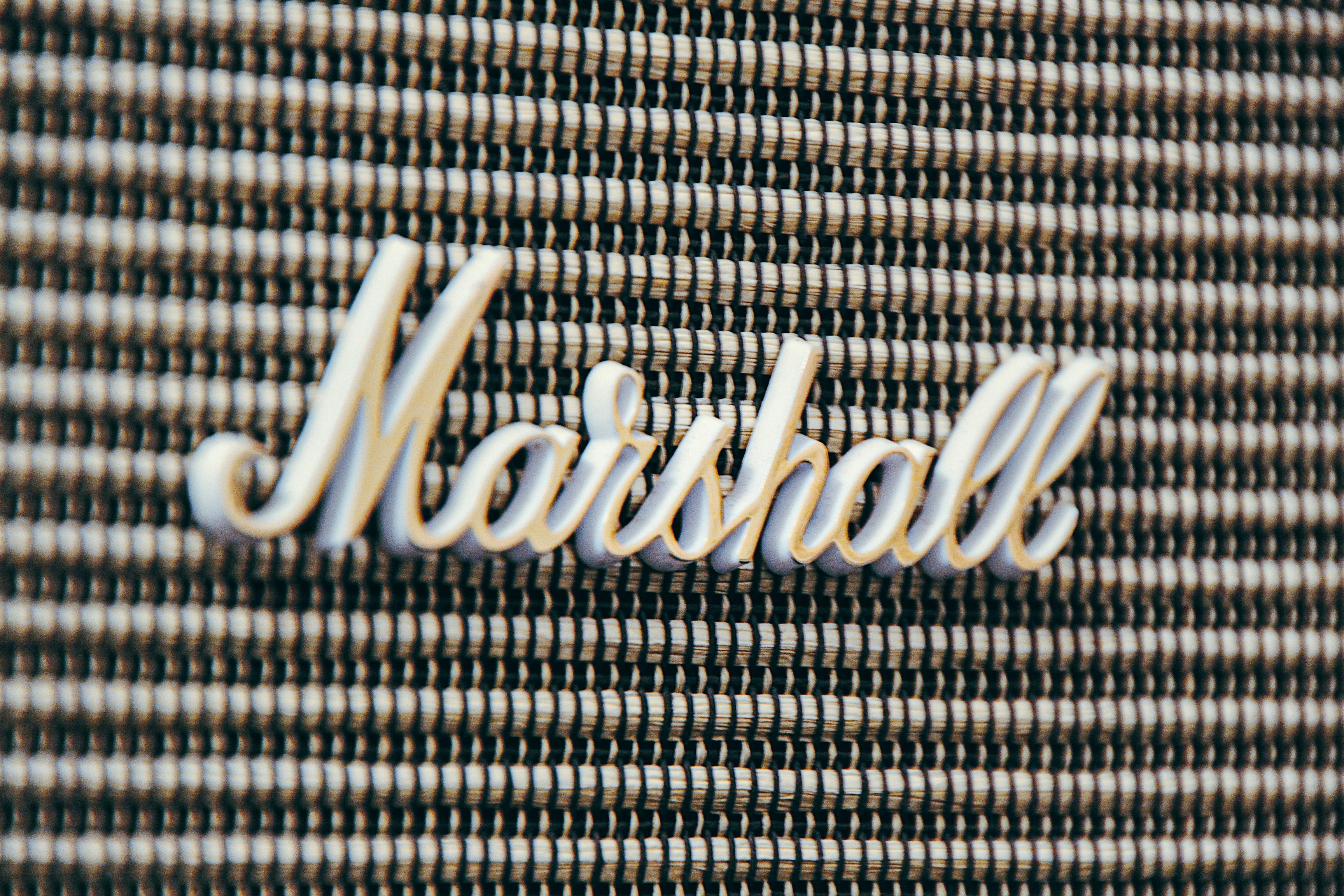 a close up of the word marshall on a wall
