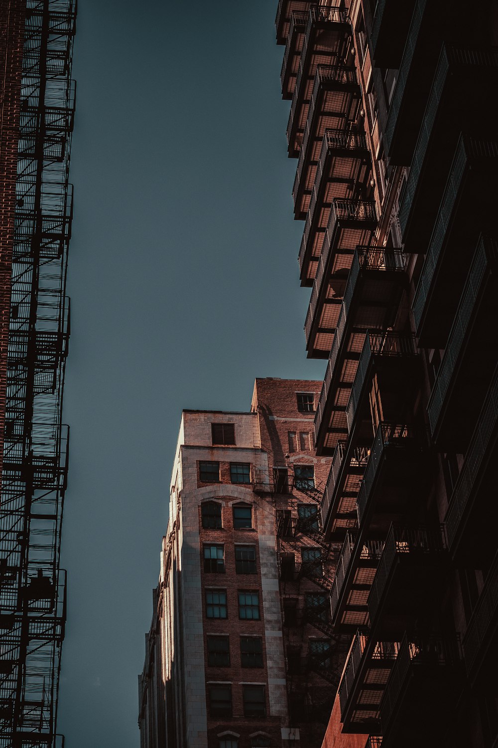 a very tall building next to a very tall building