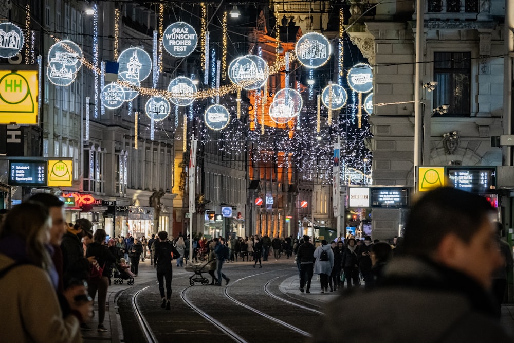 a busy city street filled with lots of people