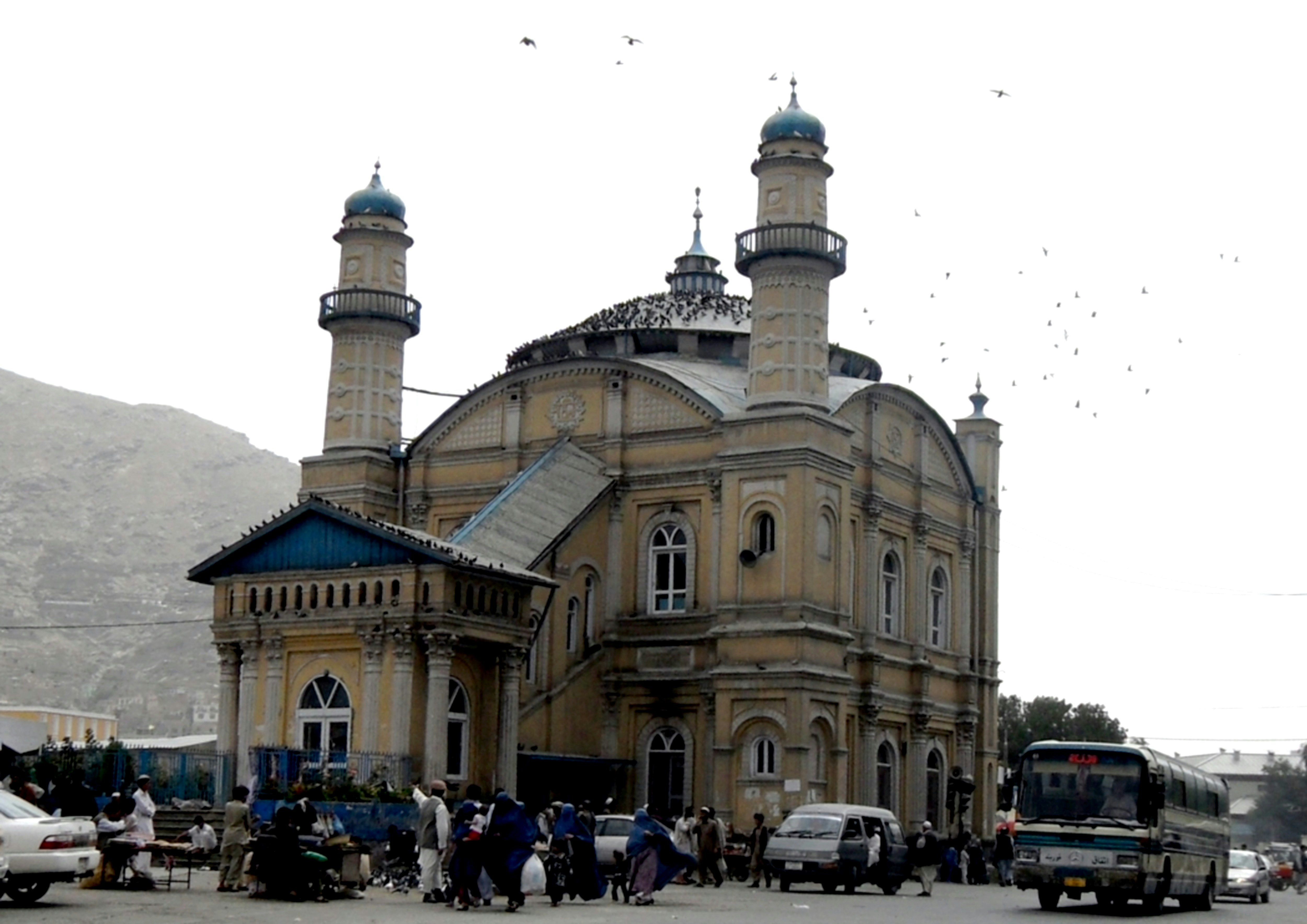 a large building with two towers on top of it