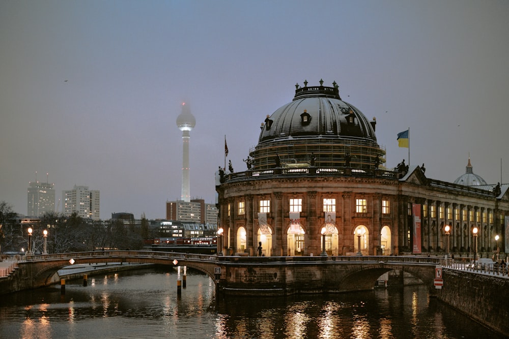 a large building with a bridge going across it