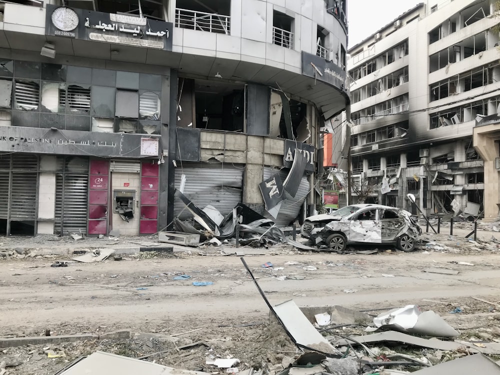 a run down building with a bunch of debris on the ground