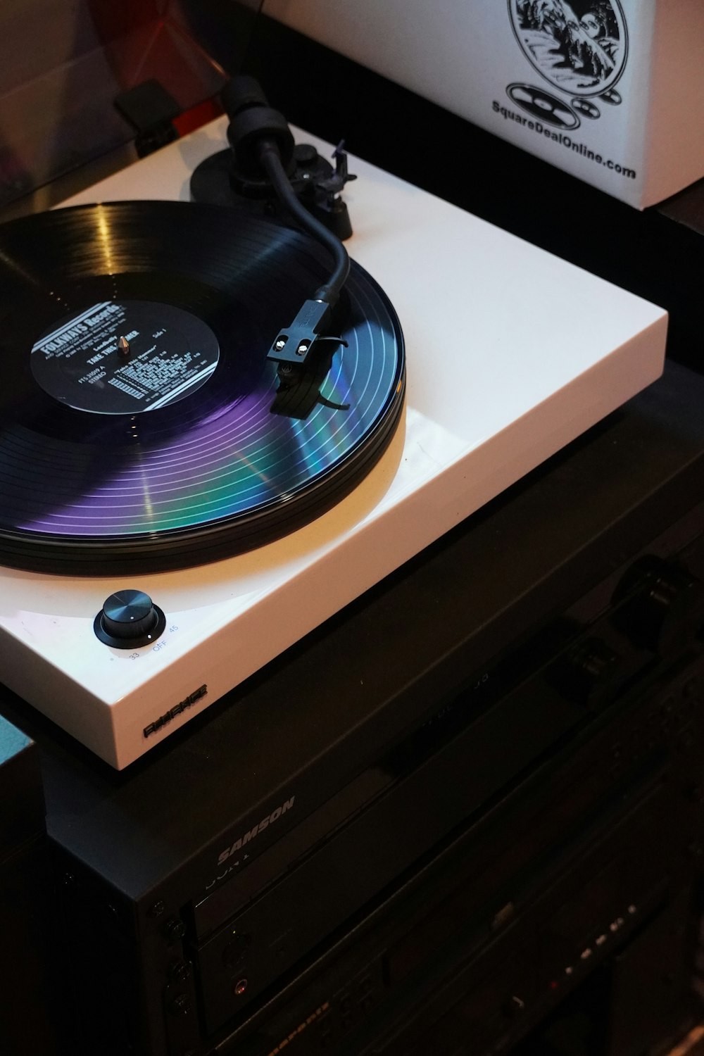a record player sitting on top of a table