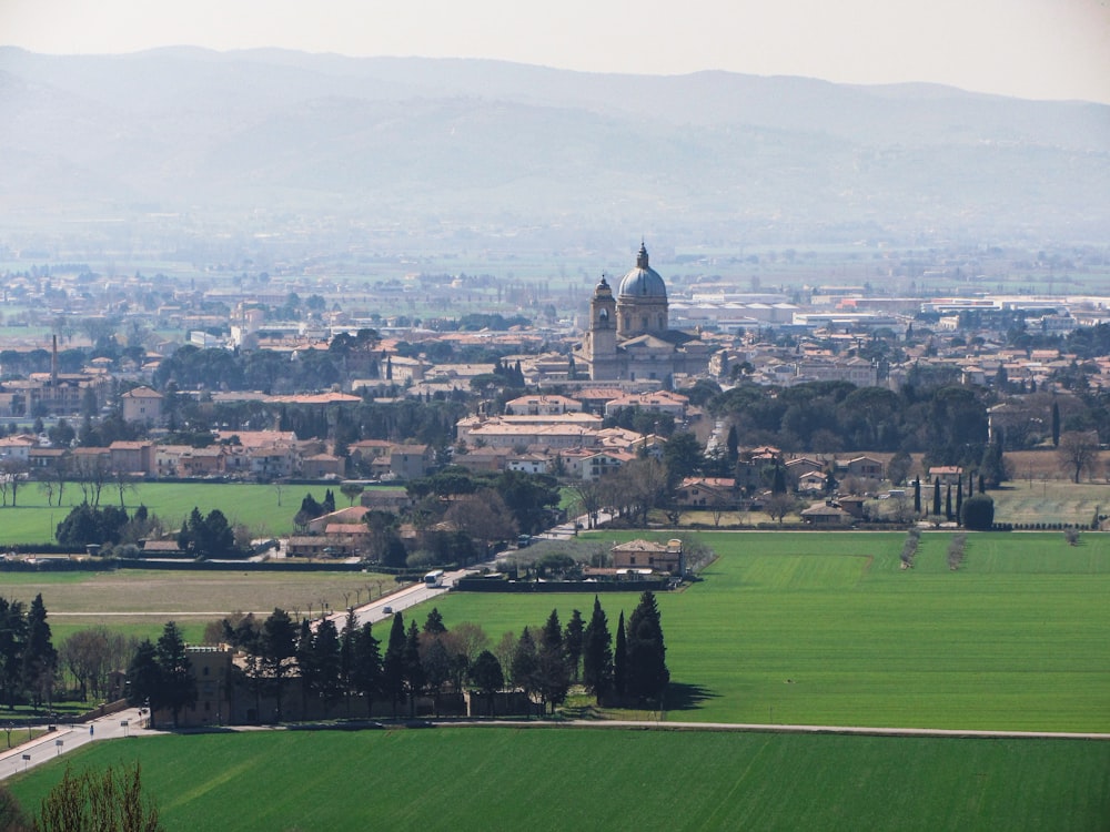 a view of a city from a hill