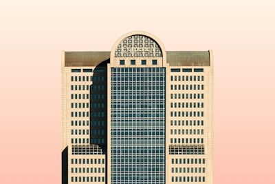 a tall building with a clock on the top of it