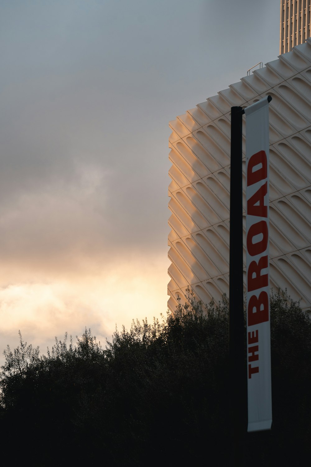 a tall building with a large sign on it's side