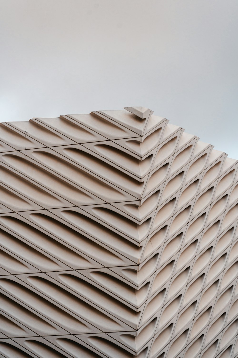 a large stack of beige tiles stacked on top of each other