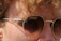 Close-up of a man wearing Vetroluce sunglasses, highlighting the fine Italian craftsmanship.