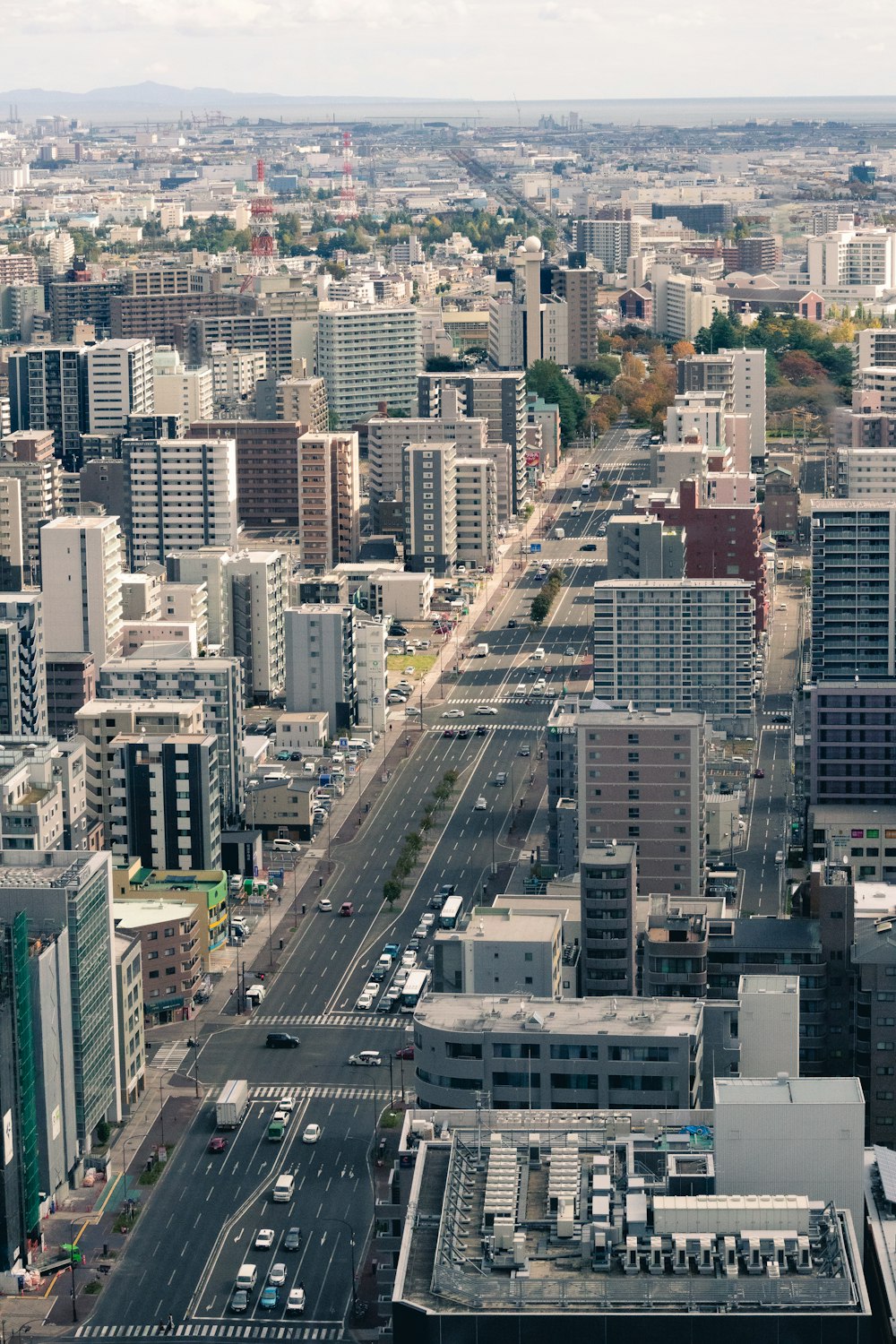 an aerial view of a city with tall buildings