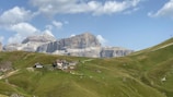 a house in the middle of a mountain range