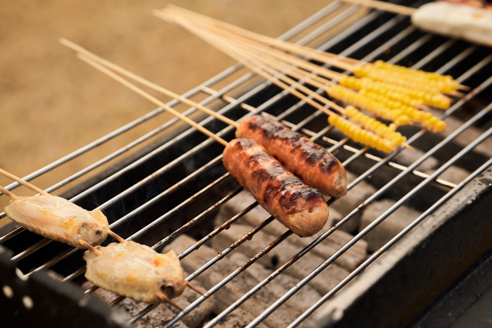 a close up of a grill with food on it