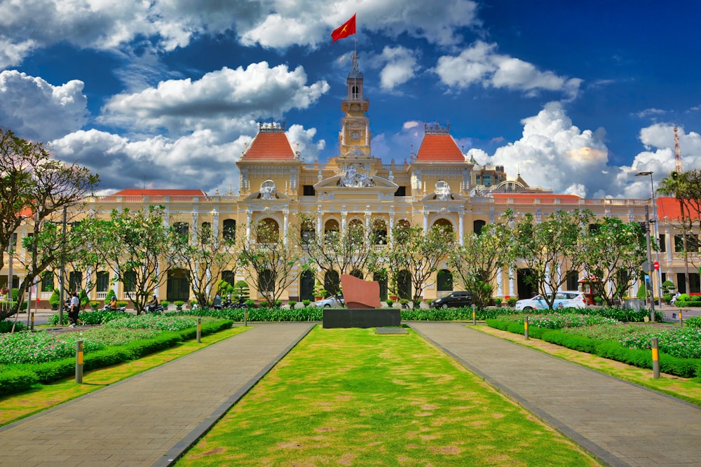 a large building with a red flag on top of it