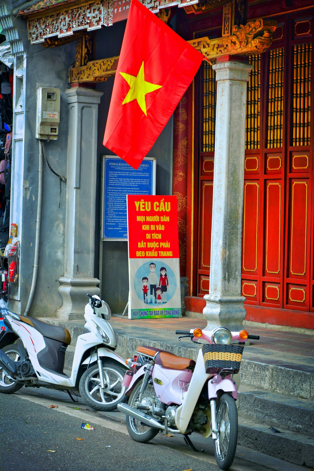 a scooter parked on the side of a street