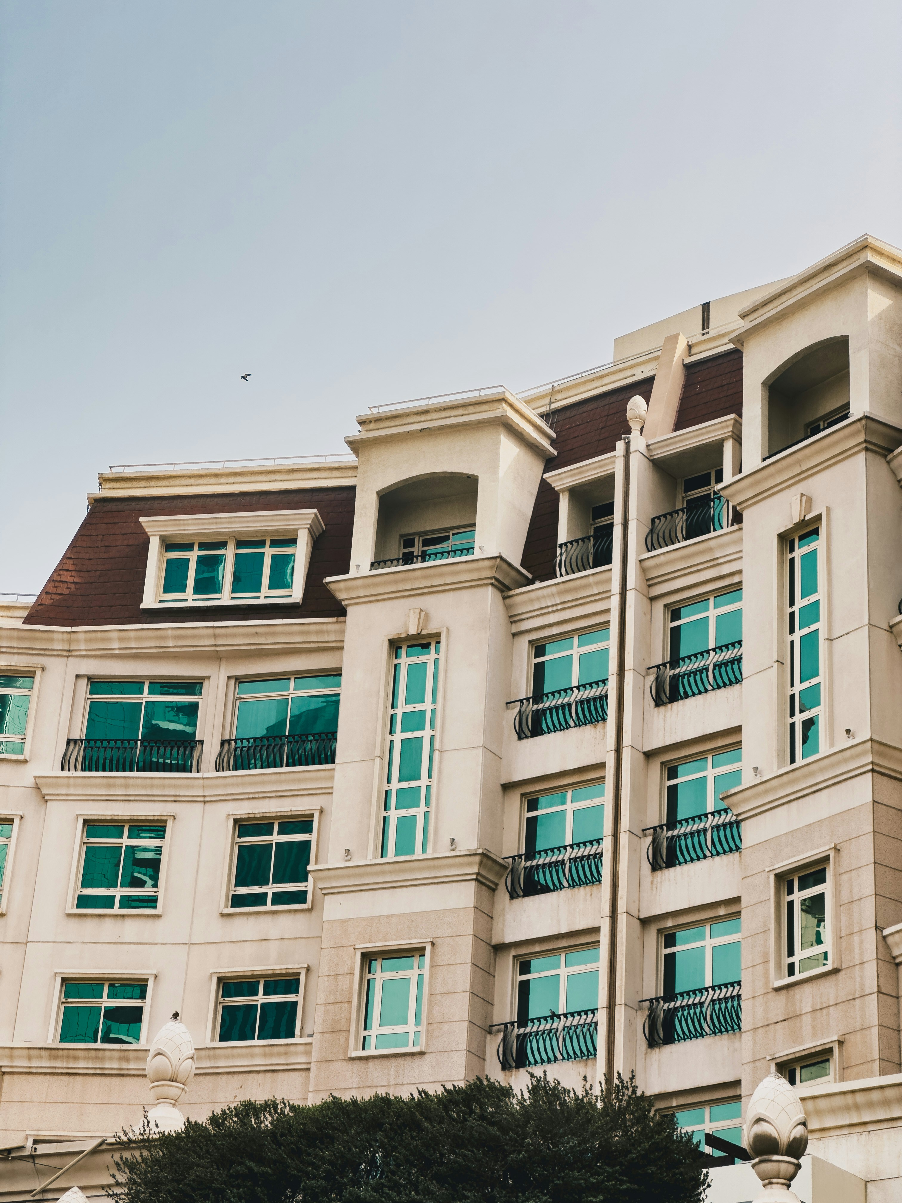a large building with many windows and balconies