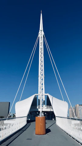 Photo of a modern pedestrian bridge made with PRFV pultruded composites, showcasing sleek design and durability.