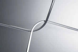 Modern steel furniture pieces crafted with laser-cut details.