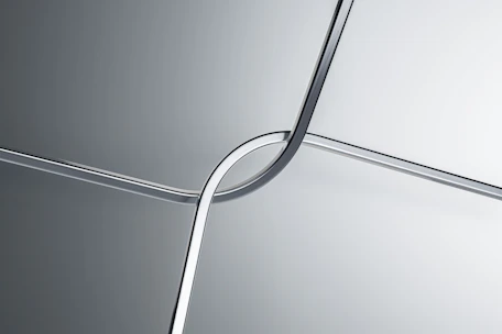 Modern steel furniture pieces crafted with laser-cut details.