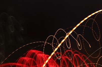 a blurry photo of lights in the dark
